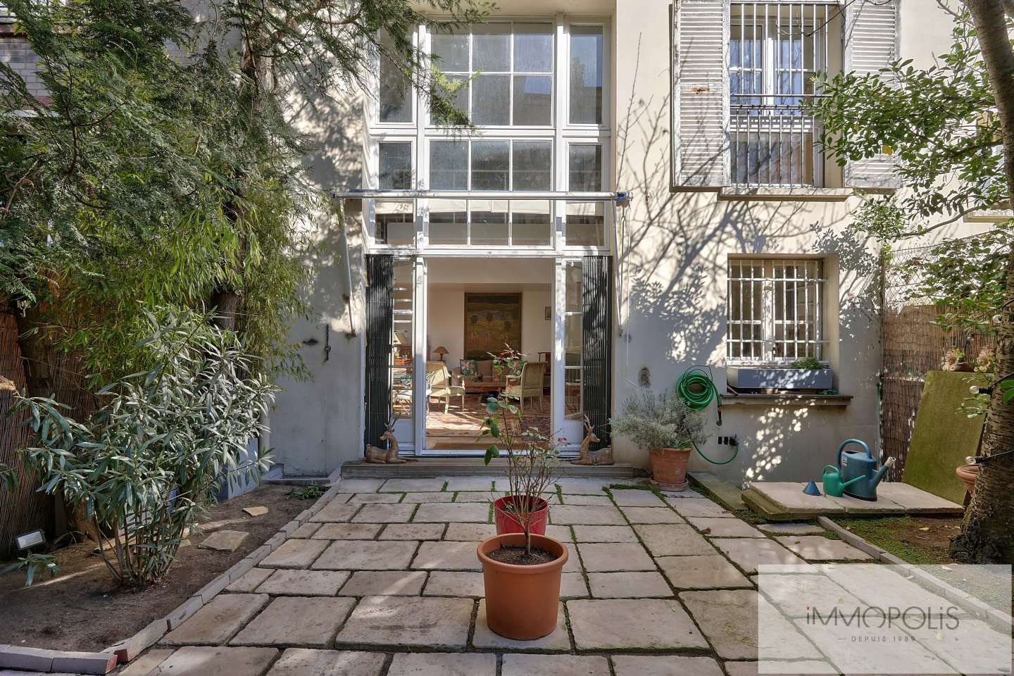 Bel atelier avec jardin en plein Montmartre. 14