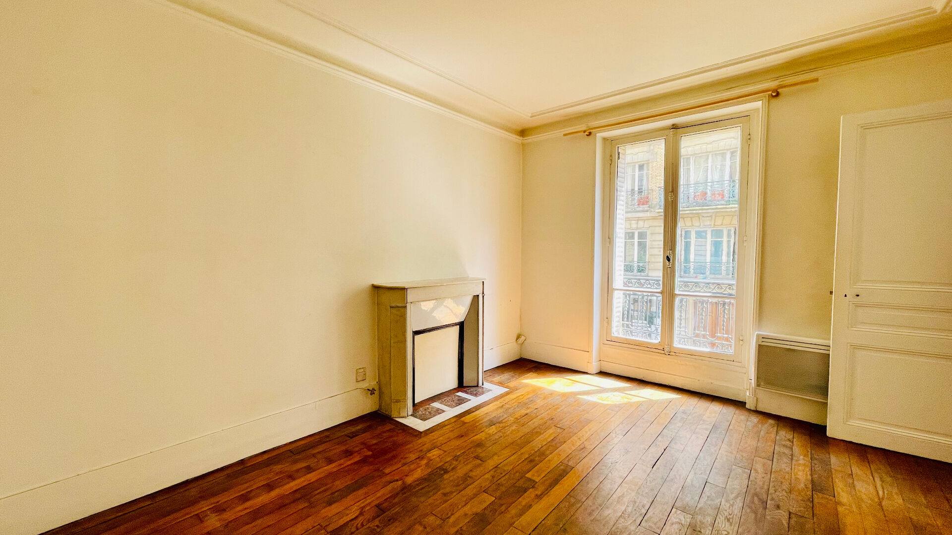 Appartement à moderniser : 3 pièces avec charme de l’ancien, rue Championnet (portion piétonne) 4