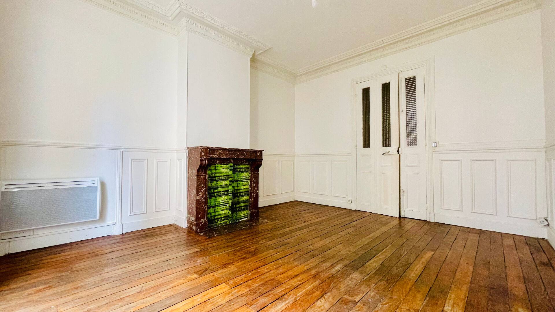 Appartement à moderniser : 3 pièces avec charme de l’ancien, rue Championnet (portion piétonne) 7