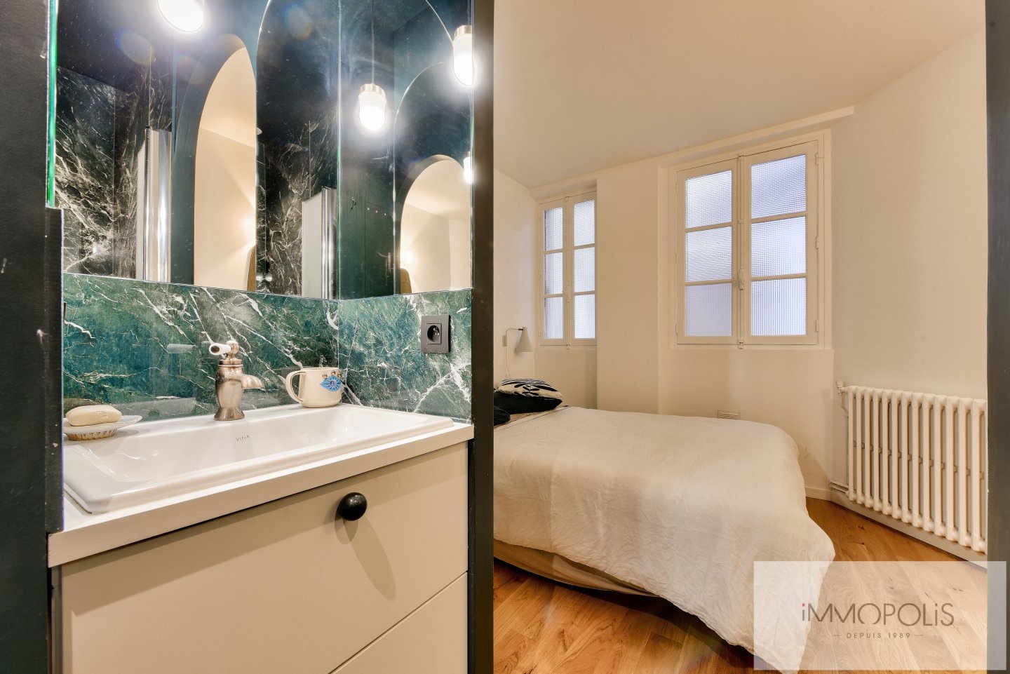 Appartement entièrement rénové par architecte en plein coeur des Abbesses. 14