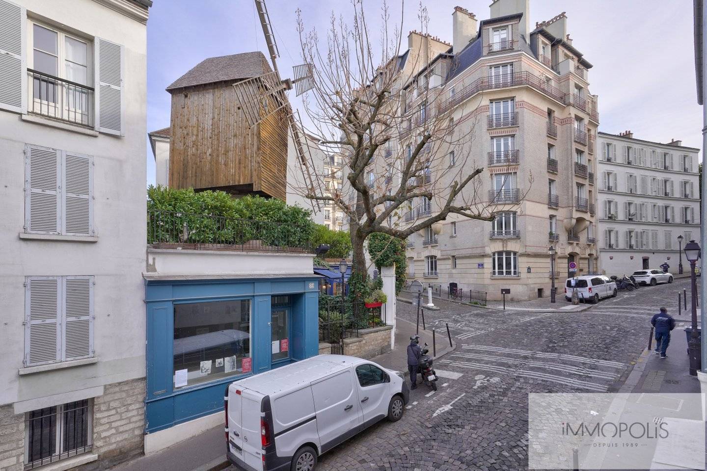 Rue Lepic view of the Moulin de la Galette. 5