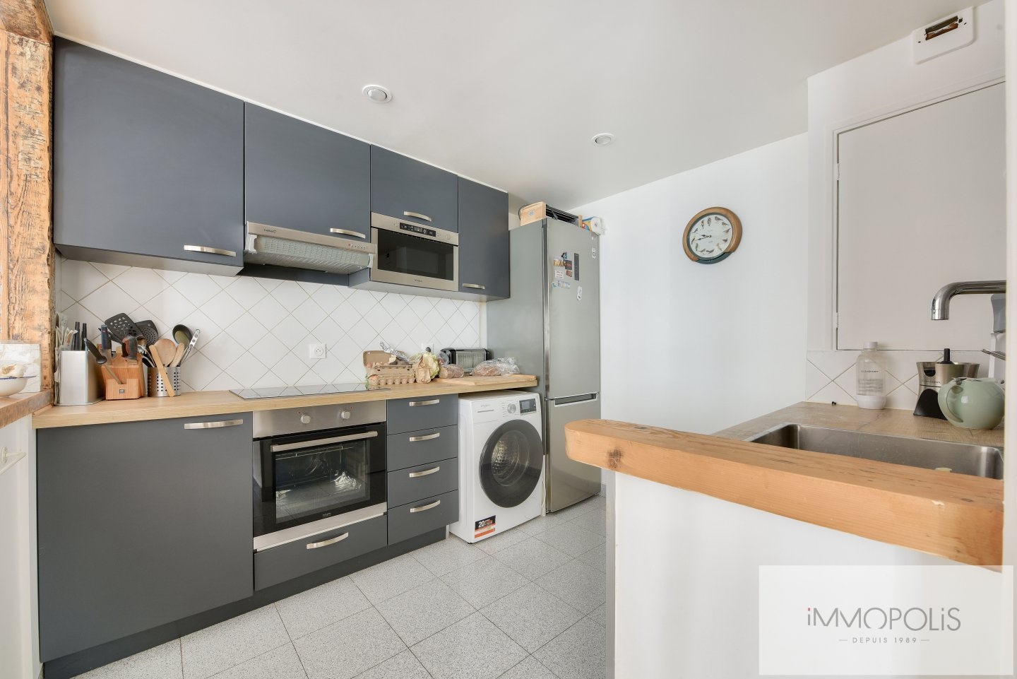 SOLD OCCUPIED – Private residence at Moulin de la Galette in Montmartre. 11