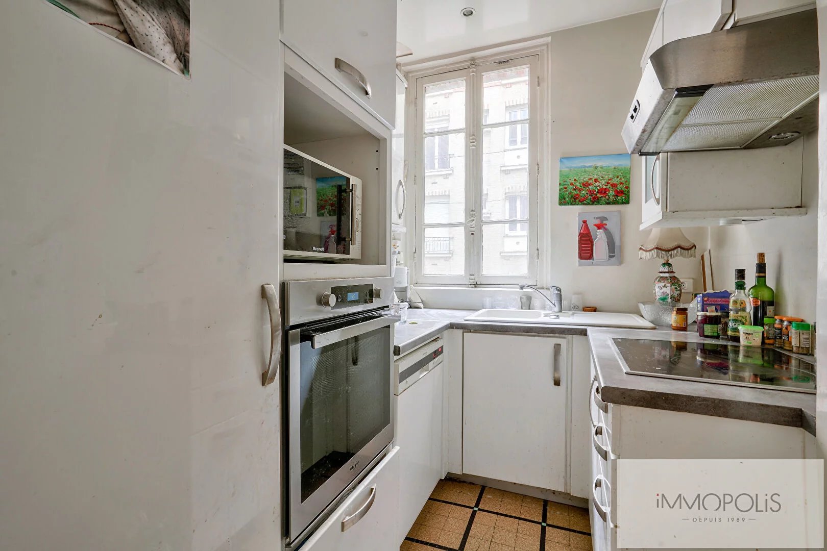 Opportunité rare : vente en nue – propriété d’un charmant appartement à moderniser, quartier Lamarck-Caulaincourt 10 Opportunité rare : vente en nue – propriété d’un charmant appartement à moderniser, quartier Lamarck-Caulaincourt 10